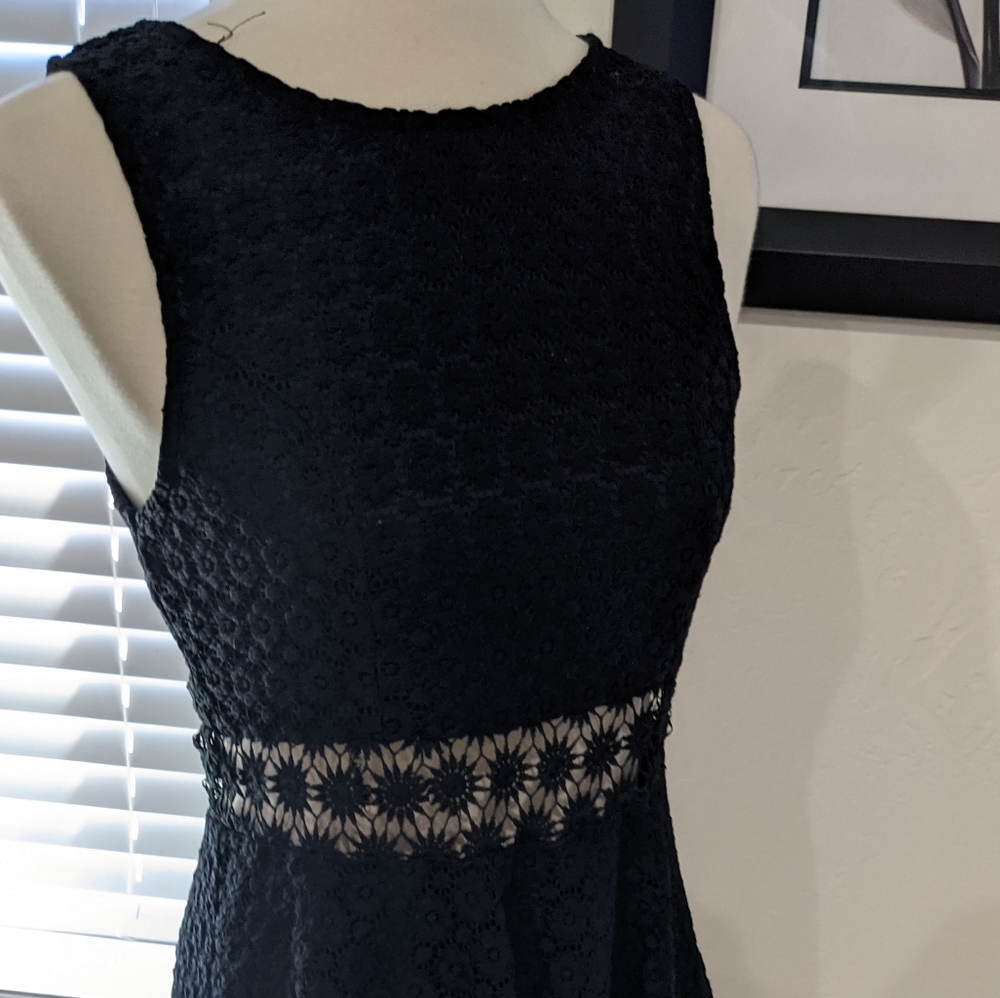 NWOT black crochet dress with peekaboo mid line